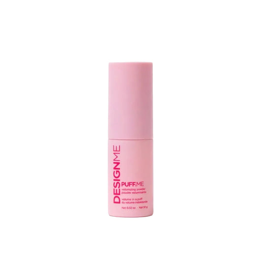 A pink cylindrical cosmetic puff bottle labeled 'DESIGNME PUFF ME' on a clean white background.